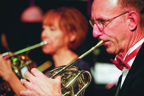 two French horn players