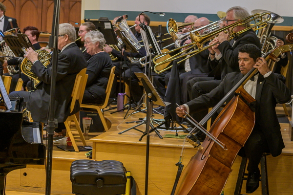 brass players and upright bass player