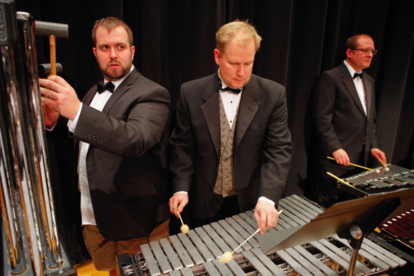 three men playing chimes, vibes and glockenspiel