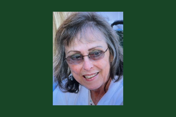 smiling woman wearing glasses